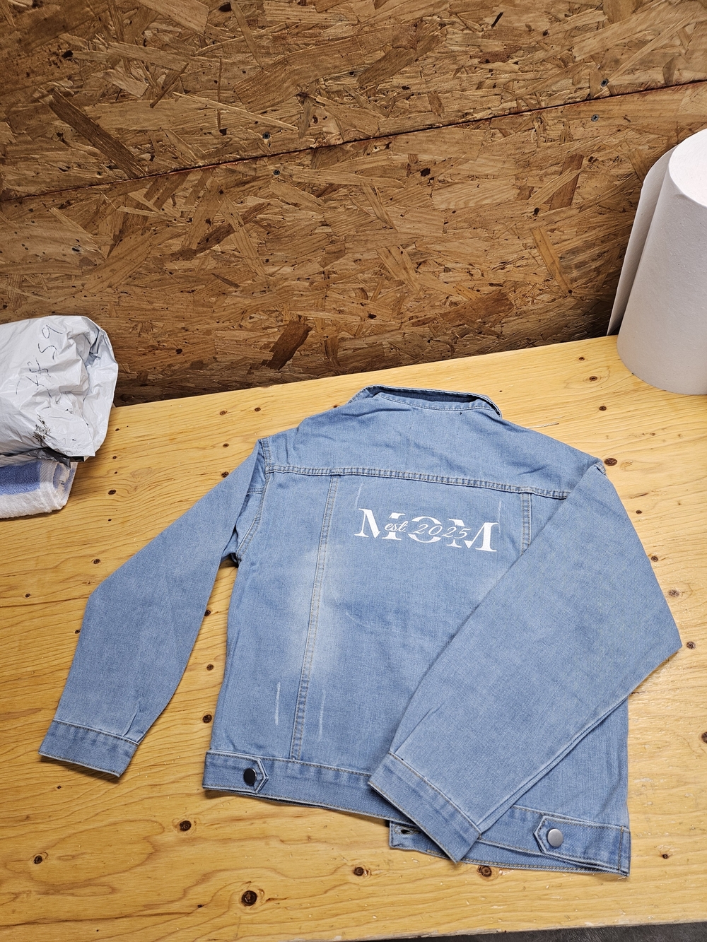 Light Blue Denim Jean Jacket with White Back Logo